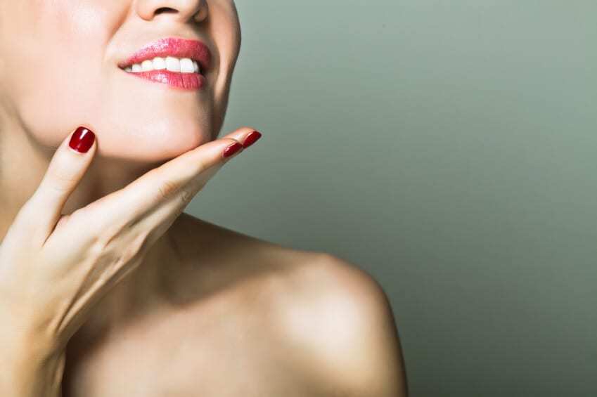 Woman holding her chin