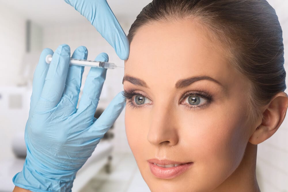 Female patient being injected with Botox