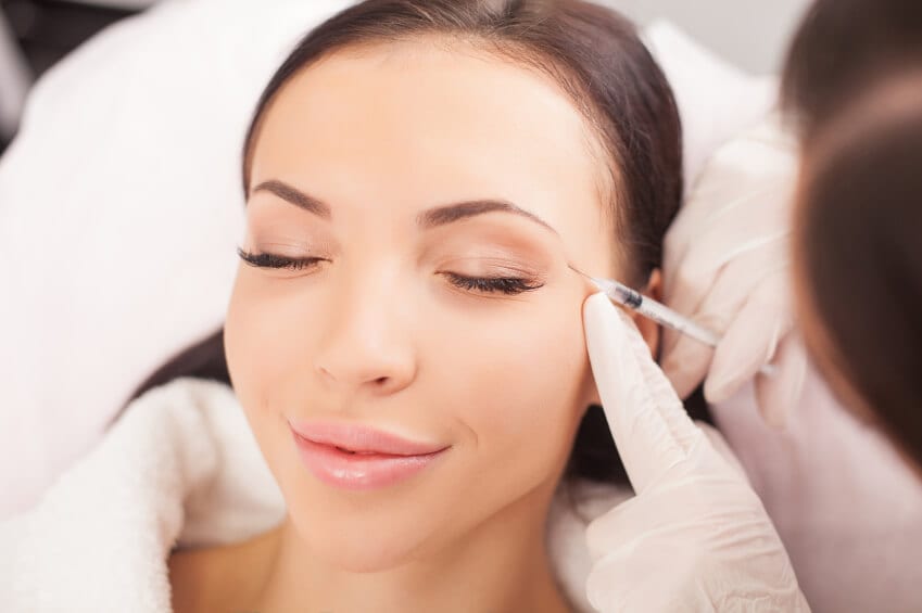 Female patient being injected with Botox