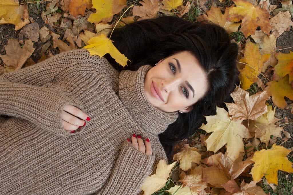 Woman laying down on the ground