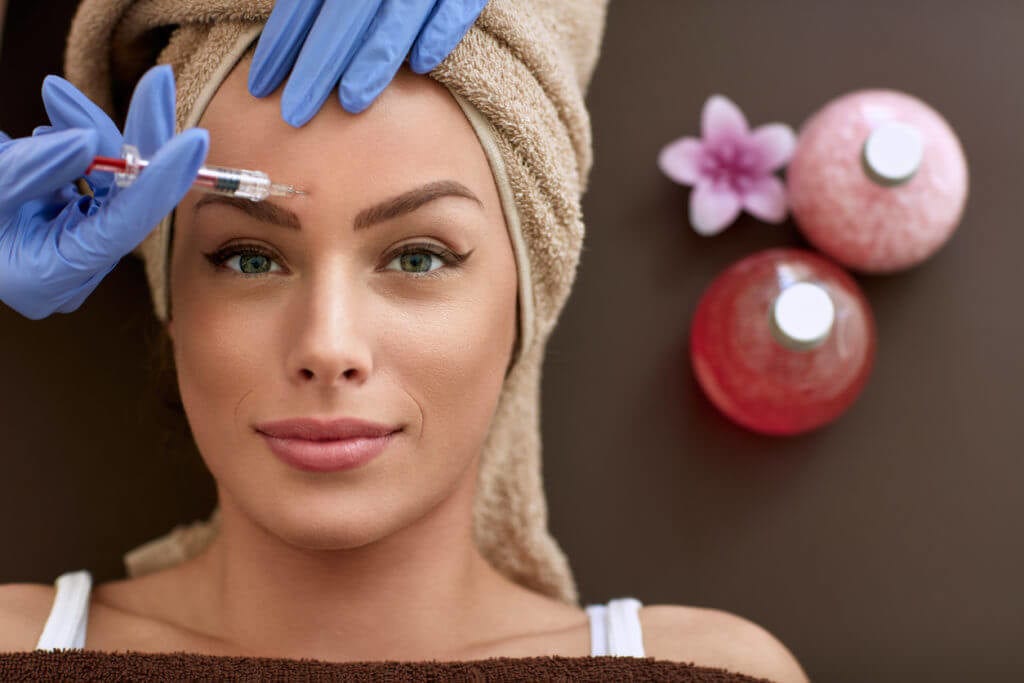 Female patient being injected with Botox