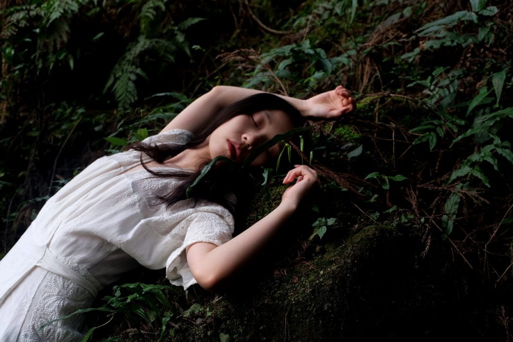 Woman lying in ground